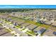 Aerial view of a large residential neighborhood with solar panels at 1157 Torrente Ln, Haines City, FL 33844