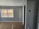 Bright bedroom featuring large windows and neutral wall tones at 645 W 6Th St, Lakeland, FL 33805