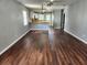 Large living room with dark brown wood flooring at 645 W 6Th St, Lakeland, FL 33805
