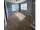 Spacious bedroom with neutral walls and carpet at 645 W 6Th St, Lakeland, FL 33805