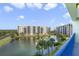 Balcony view overlooking a pond and the community at 5300 S Atlantic Ave # 15-403, New Smyrna Beach, FL 32169