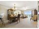 Spacious living room features ample natural light and comfortable seating at 5300 S Atlantic Ave # 15-403, New Smyrna Beach, FL 32169