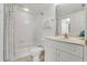Clean bathroom with shower/tub combo and vanity at 5300 S Atlantic Ave # 15-403, New Smyrna Beach, FL 32169