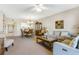 Open living and dining area with ample seating and natural light at 5300 S Atlantic Ave # 15-403, New Smyrna Beach, FL 32169