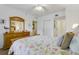 Bedroom with a full-size bed and built-in dresser at 5300 S Atlantic Ave # 15-403, New Smyrna Beach, FL 32169