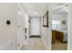 Bright entryway with tile flooring, leading to bedrooms and other areas at 5300 S Atlantic Ave # 15-403, New Smyrna Beach, FL 32169