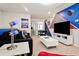 Star Wars themed game room with foosball table and large TV at 3982 Lana Ave, Davenport, FL 33897