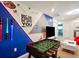 Fun game room with foosball table and Star Wars decor at 3982 Lana Ave, Davenport, FL 33897