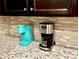 Granite countertop with coffee maker and drip coffee machine at 3982 Lana Ave, Davenport, FL 33897