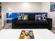 Cozy basement sitting area with Star Wars themed pillows at 3982 Lana Ave, Davenport, FL 33897