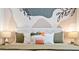 Bedroom with a king-size bed and abstract wall art at 3982 Lana Ave, Davenport, FL 33897