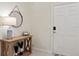 Bright entryway with a console table and mirror at 3982 Lana Ave, Davenport, FL 33897