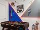 Game room features foosball and Star Wars wall art at 3982 Lana Ave, Davenport, FL 33897
