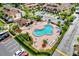 Community pool with lounge chairs and surrounding landscaping at 2715 Autumn Green Dr, Orlando, FL 32822