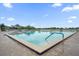 Inviting community pool with lounge chairs at 2715 Autumn Green Dr, Orlando, FL 32822