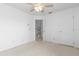 Bright and airy bedroom with carpeted floor and neutral walls at 2715 Autumn Green Dr, Orlando, FL 32822