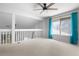Bright bedroom with ceiling fan and loft view at 2715 Autumn Green Dr, Orlando, FL 32822