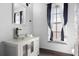 Modern bathroom with glass vessel sink and updated vanity at 2715 Autumn Green Dr, Orlando, FL 32822