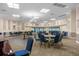 Spacious community room with tables, chairs, and a dance floor at 2715 Autumn Green Dr, Orlando, FL 32822