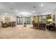 Elegant community lobby with comfortable seating and a chandelier at 2715 Autumn Green Dr, Orlando, FL 32822
