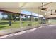 Spacious sunroom with golf course views and ceiling fans at 2715 Autumn Green Dr, Orlando, FL 32822