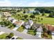 Houses near golf course and pond. Community view at 2715 Autumn Green Dr, Orlando, FL 32822
