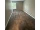 Simple bedroom with carpeted floors and a closet at 6003 Village Cir # Ge, Orlando, FL 32822