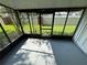 Relaxing screened porch overlooking the backyard at 6003 Village Cir # Ge, Orlando, FL 32822