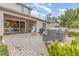 Backyard patio with fire pit and seating area, perfect for outdoor entertaining at 222 Emmy Cv, Oviedo, FL 32765