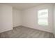 Bright bedroom with carpeted floor and window with blinds at 15031 Sw 28Th Terrace Rd, Ocala, FL 34473