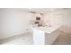 Modern kitchen with stainless steel appliances and a spacious island at 15031 Sw 28Th Terrace Rd, Ocala, FL 34473