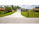 New construction home with a large yard and a long driveway at 15031 Sw 28Th Terrace Rd, Ocala, FL 34473