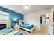Twin bedroom with Minion theme and hallway access at 1586 Lima Ave, Kissimmee, FL 34747