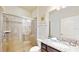 Clean bathroom with shower/tub combo, granite vanity, and a spacious feel at 1586 Lima Ave, Kissimmee, FL 34747