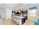 Modern kitchen with stainless steel appliances and granite countertops at 1586 Lima Ave, Kissimmee, FL 34747