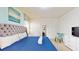 Main bedroom with king-size bed, a large mirror, and plenty of closet space at 1586 Lima Ave, Kissimmee, FL 34747