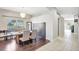 Elegant dining room with rustic wooden table and hardwood floors at 2524 Dover Glen Cir, Orlando, FL 32828