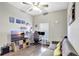Home office featuring a large desk, comfortable sofa and plenty of storage at 2524 Dover Glen Cir, Orlando, FL 32828