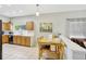 Bright kitchen features light wood cabinets, ample counter space, and a breakfast nook at 2524 Dover Glen Cir, Orlando, FL 32828