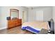 Bright bedroom with wood floors and ample closet space at 2524 Dover Glen Cir, Orlando, FL 32828