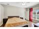 Large bedroom with plush carpet and plenty of natural light at 2524 Dover Glen Cir, Orlando, FL 32828