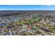 Aerial view showing home's location in a neighborhood with a golf course and lake at 2524 Dover Glen Cir, Orlando, FL 32828