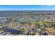 Aerial view showcasing the home's location in a desirable neighborhood near a golf course at 2524 Dover Glen Cir, Orlando, FL 32828