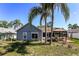 Backyard view of home with deck and gazebo at 3229 Clewiston St, Deltona, FL 32738