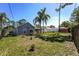 Large backyard with mature trees and a shed at 3229 Clewiston St, Deltona, FL 32738