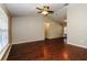 Spacious living room with dark hardwood floors and high ceilings at 3229 Clewiston St, Deltona, FL 32738