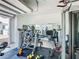 Home gym with a variety of strength training and cardio equipment at 15680 Panther Lake Dr, Winter Garden, FL 34787