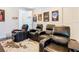 Home theater with four recliner seats and movie posters at 15680 Panther Lake Dr, Winter Garden, FL 34787