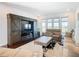 Spacious Gathering room with a large TV and comfortable seating at 15680 Panther Lake Dr, Winter Garden, FL 34787