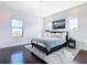 Bright bedroom with a comfortable bed and plenty of natural light at 15680 Panther Lake Dr, Winter Garden, FL 34787